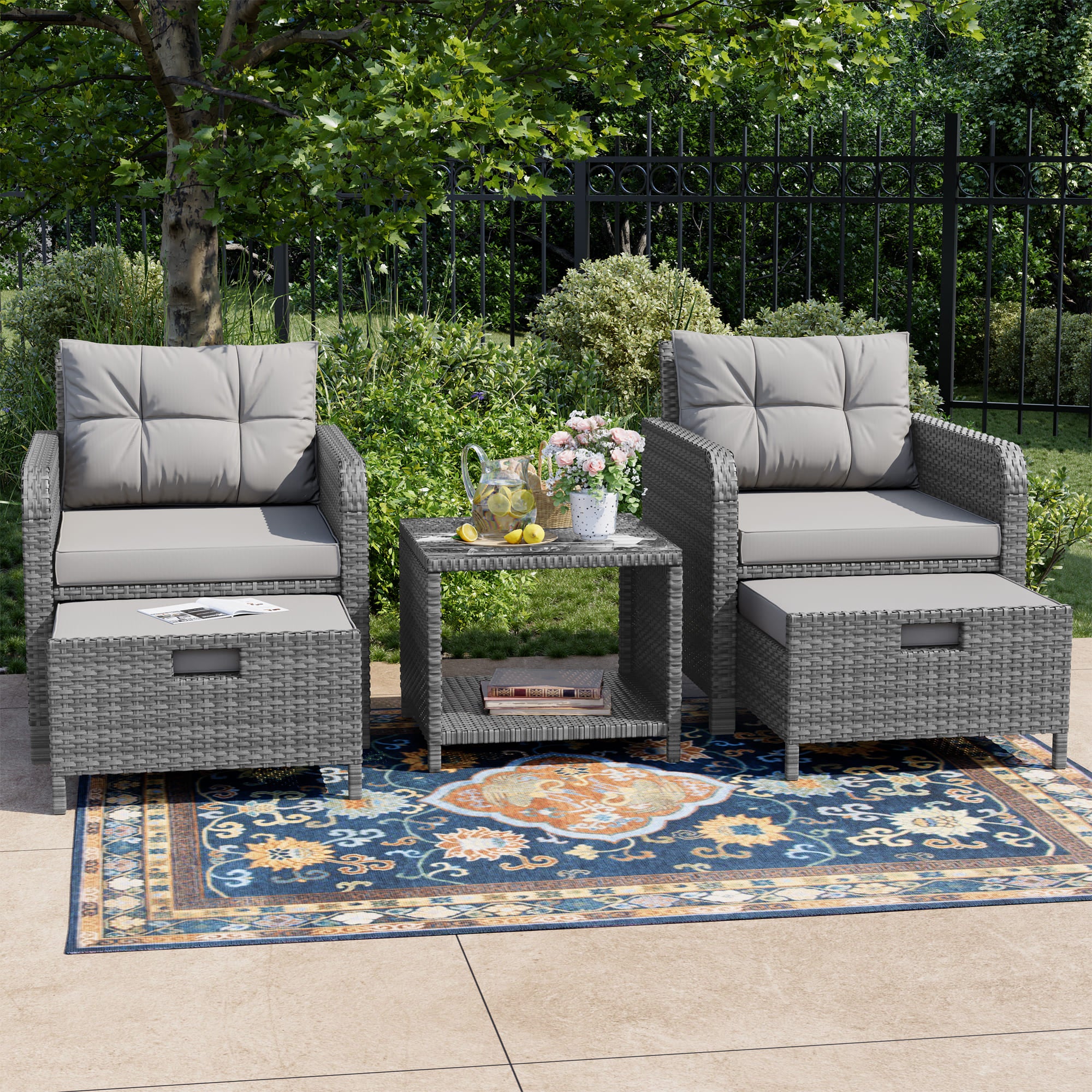 5-Piece Rattan Patio Set with Cushioned Chairs and Ottomans ¨C Front View
