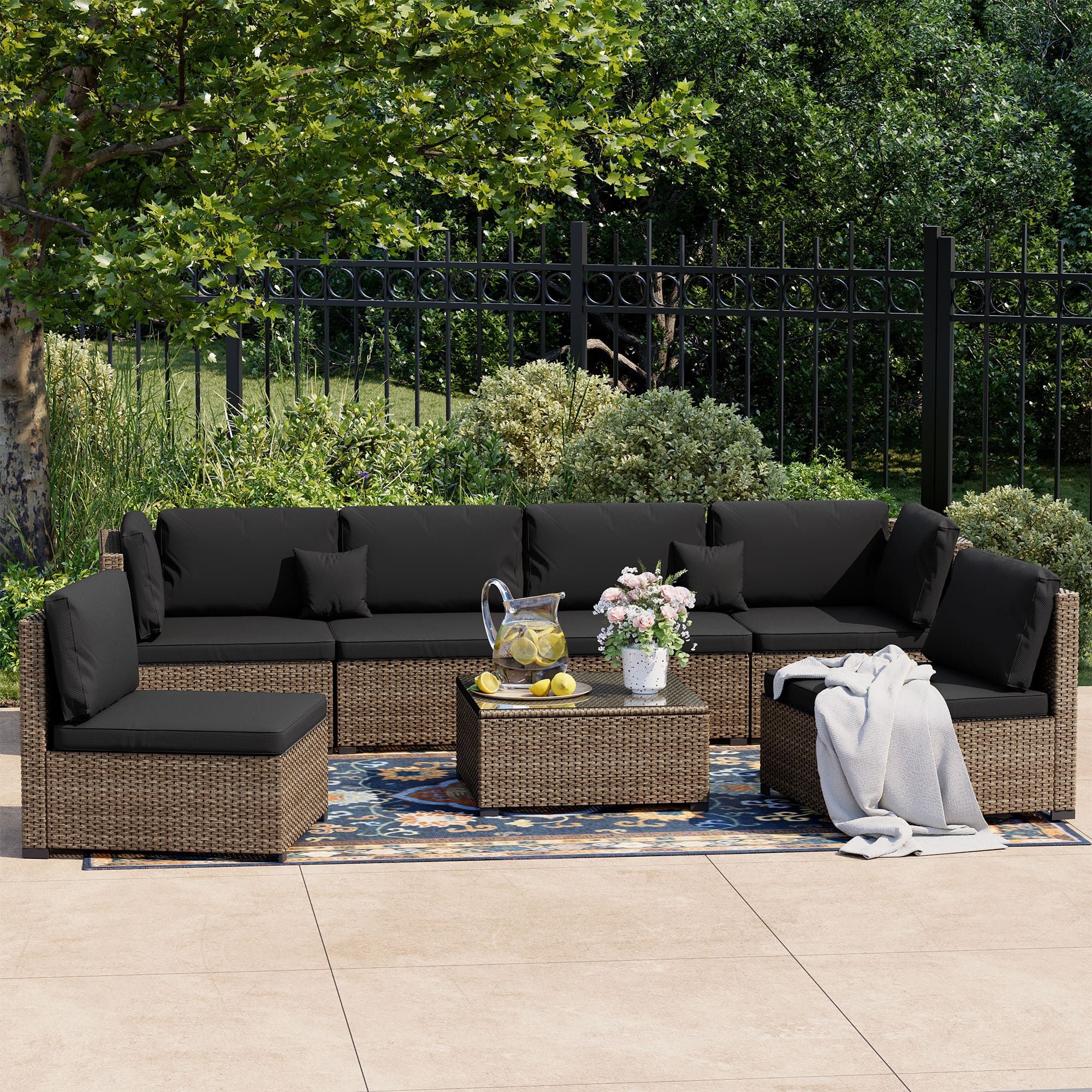 7-Piece Rattan Patio Furniture Set Arranged on Backyard Deck?