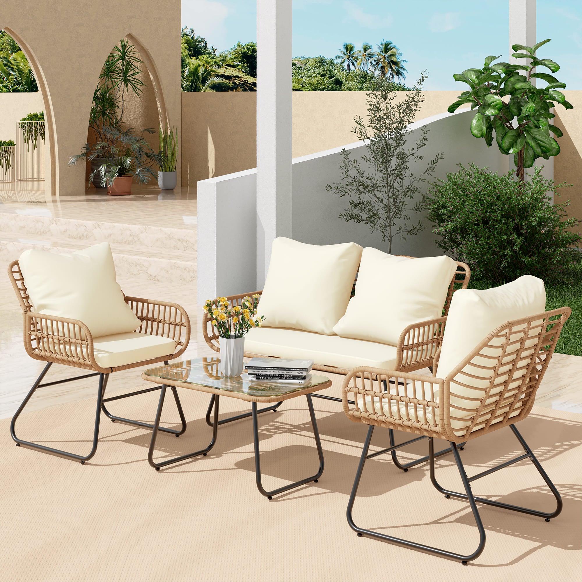Outdoor rattan furniture set with 2 chairs, loveseat, and glass-top table